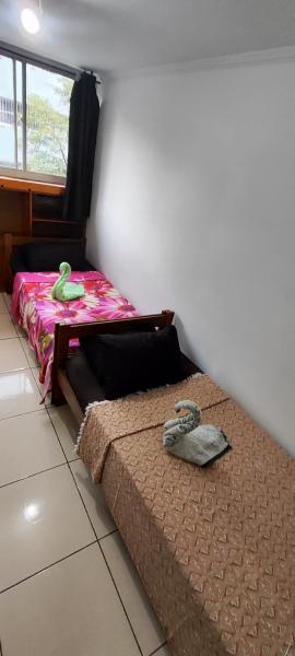 QUARTO COMPARTILHADO a 9 MINUTOS DO AEROPORTO GRU CECAP